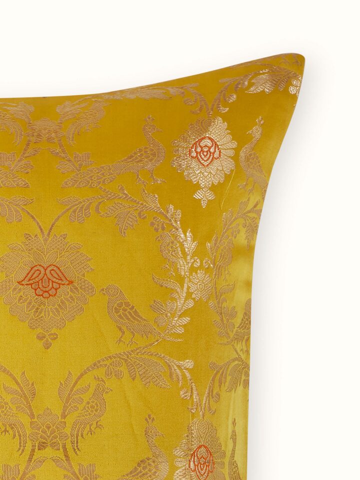 Close-up of Awadh Yellow Jaal Banarasi Handloom Silk Cushion Cover, emphasizing the luxurious silk finish and traditional craftsmanship.