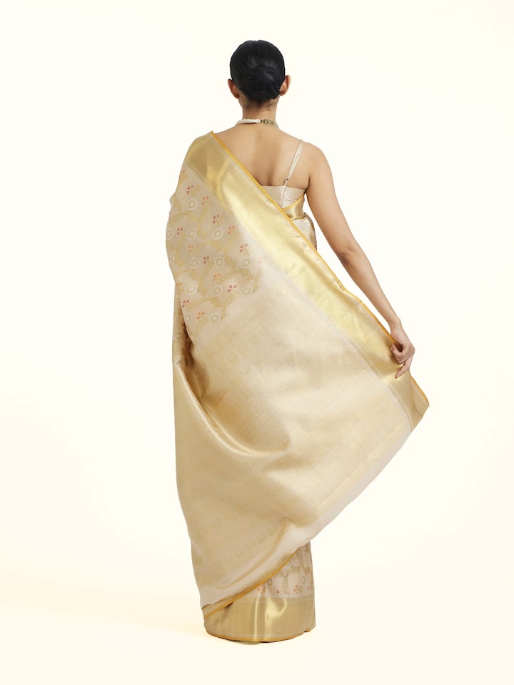 Back view of Beige Kancheepuram Silk Zari Saree emphasizing the overall design and fine details