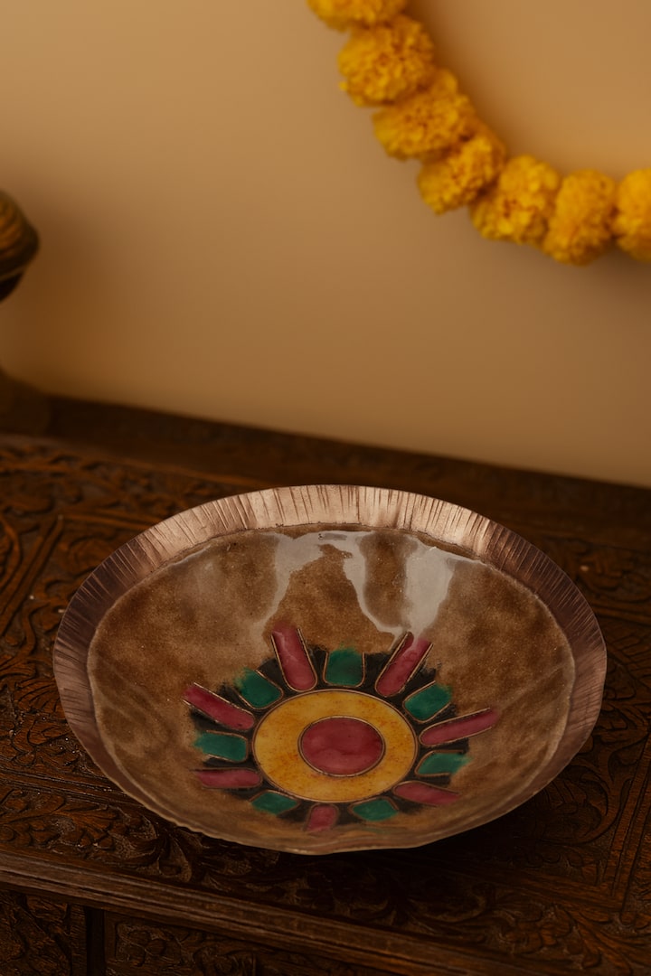 Lifestyle view of copper serving bowl handcrafted metal tableware