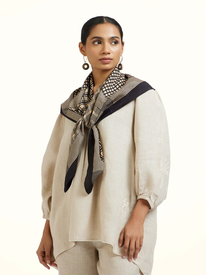 Angled view of the Black Silk Bagh Hand Block Printed Scarf