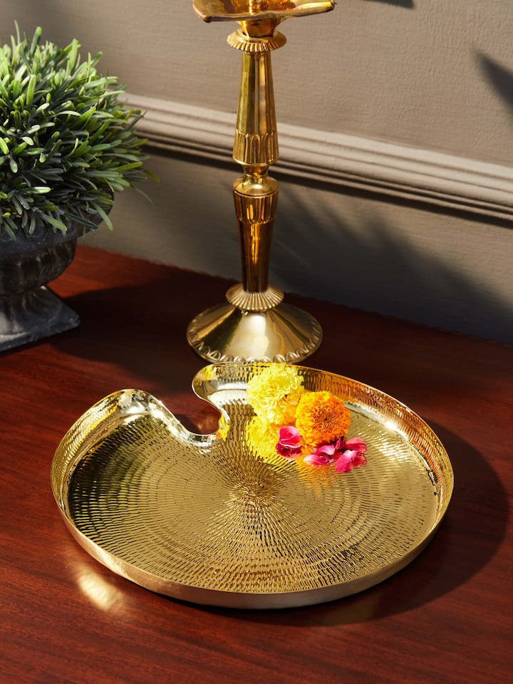 Side view of Polished Brass Pooja Thali, showcasing its intricate design and smooth brass finish.