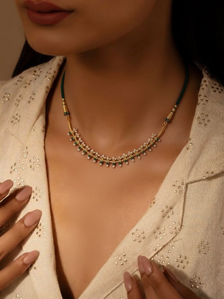 Styled view of Guttapusalu Silver Choker worn around the neck, showing how it looks styled