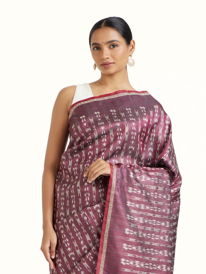 Angled view of Purple Tussar Silk Odisha Ikat Saree revealing the depth of its color and intricate pattern