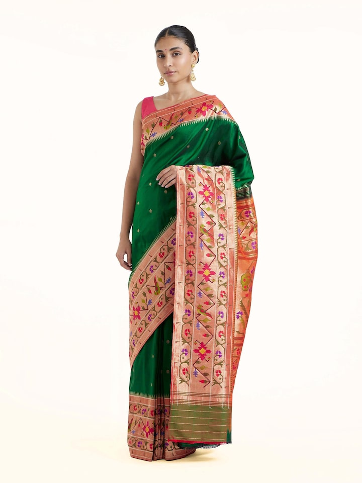 Side view of green silk Paithani saree highlighting graceful drape