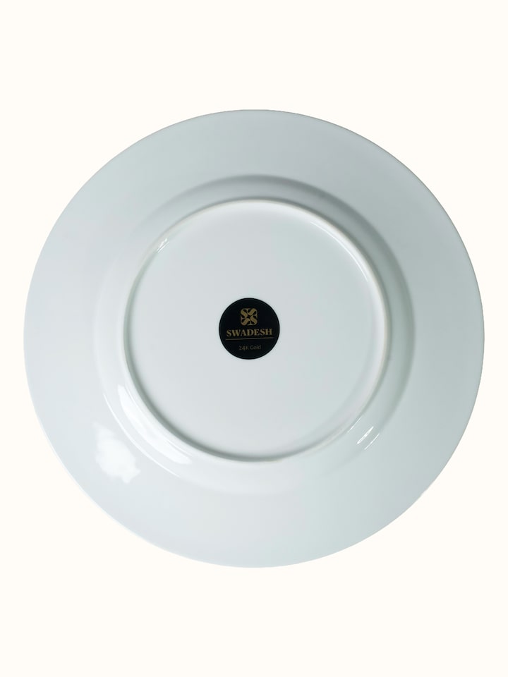 Back view of Ceramic Charger Plate With Hand-Applied Gold-Accent Motifs showing the back or base of the piece