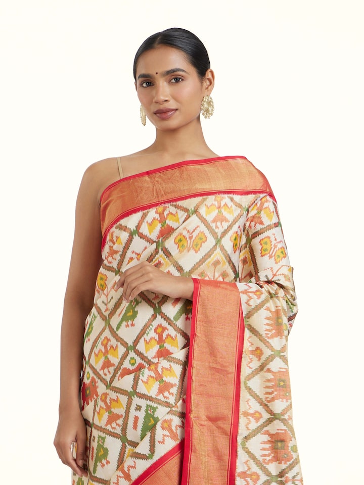 Angled view of Multi Pochampally Ikat Silk Saree revealing the depth of its color and intricate pattern