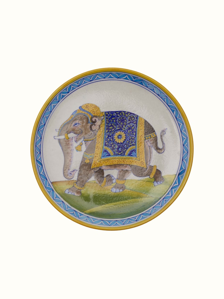 Detailed view of Blue pottery Rajasthani warrior elephant display plate focusing on the intricate patterns and hand-painted design