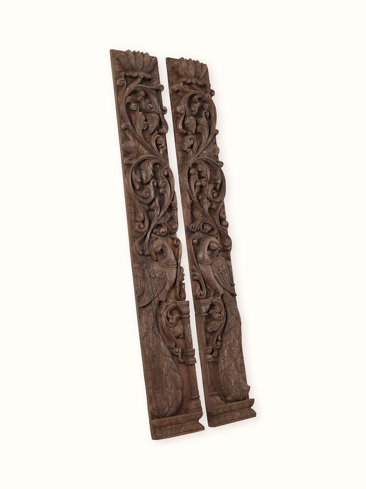 Angled view of the Wood Carved Peacock Panel (2 Pieces)