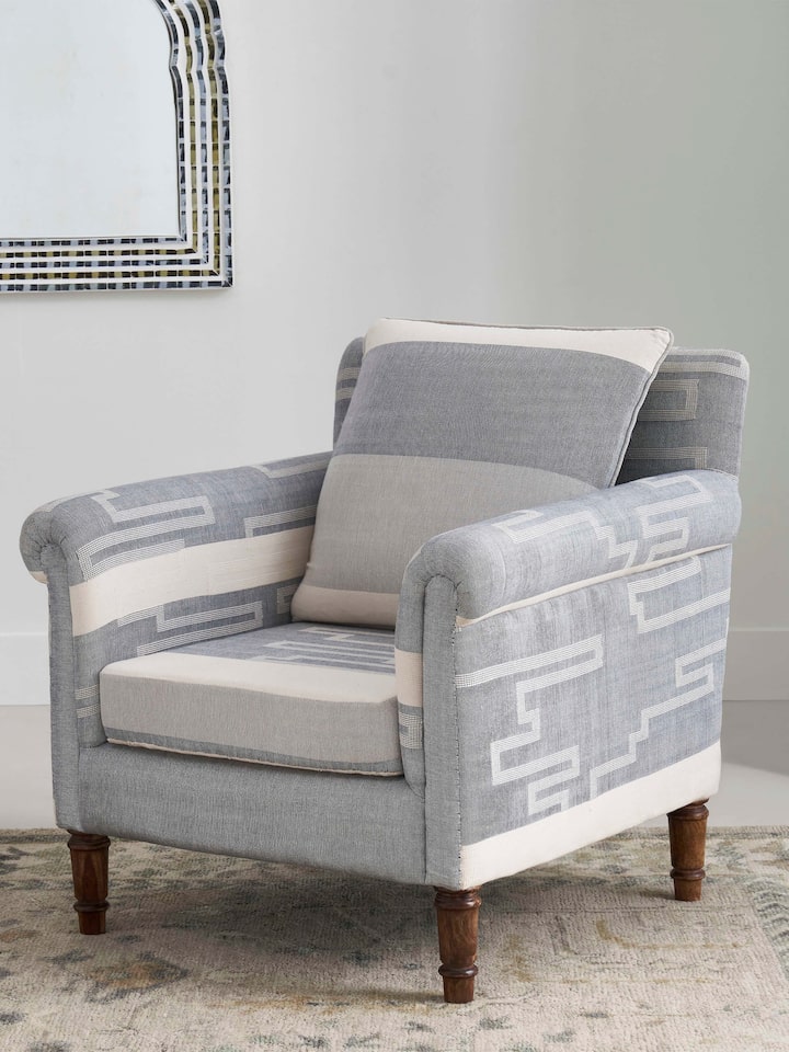 Side view of Sheesham Wood Bawan Buti Lounge Chair, highlighting the detailed woodwork and traditional style