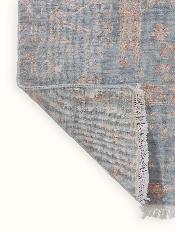 Back view of the carpet highlighting weaving technique and finishing