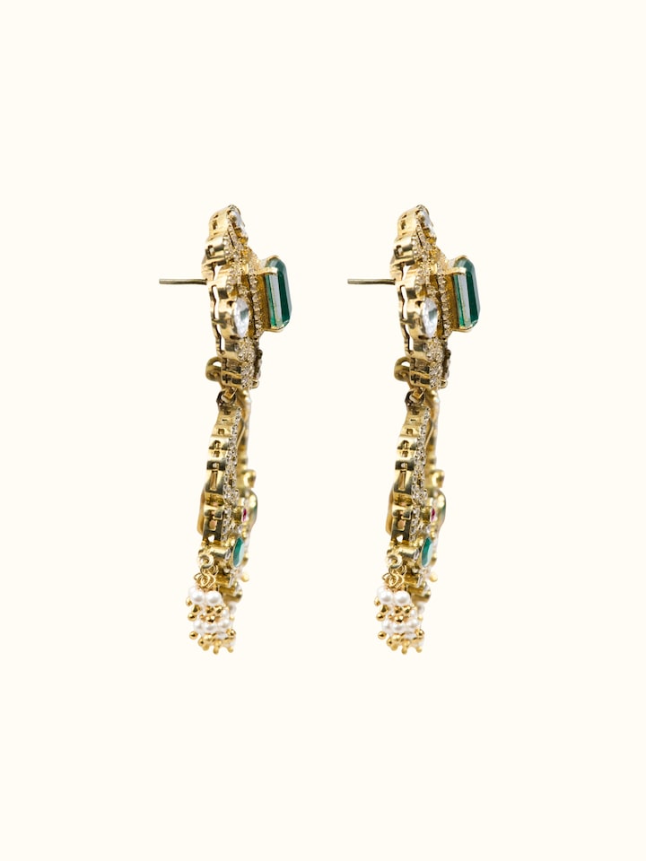 Side detail of silver smithing drop earrings