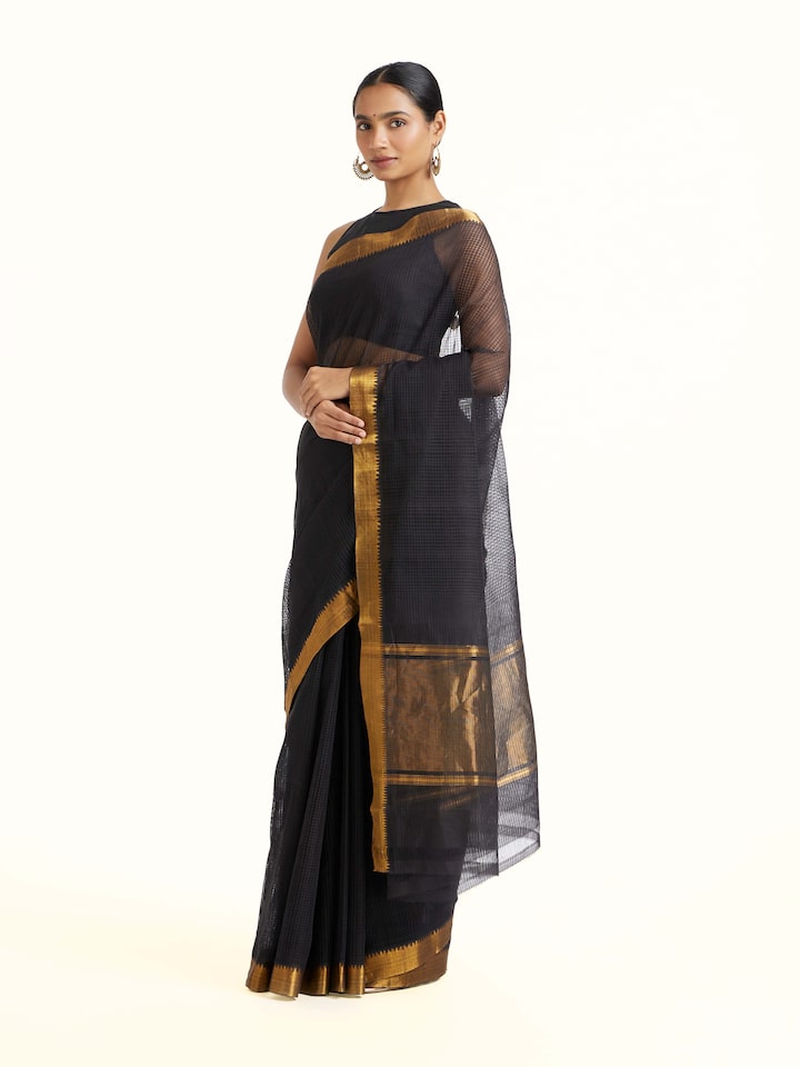 Side view of Black Cotton Blend Mangalgiri Saree highlighting the detailed craftsmanship and elegant silhouette