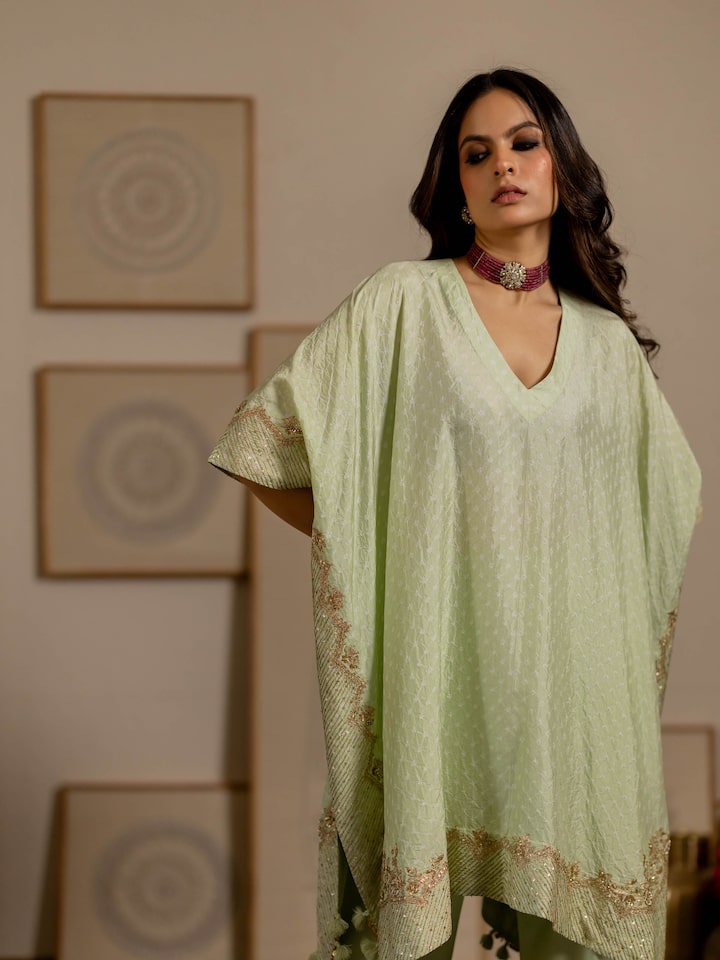 Angled view of the Mint Green Silk Hand Embroidered Bandhani Co-ord Set (2 Pcs)