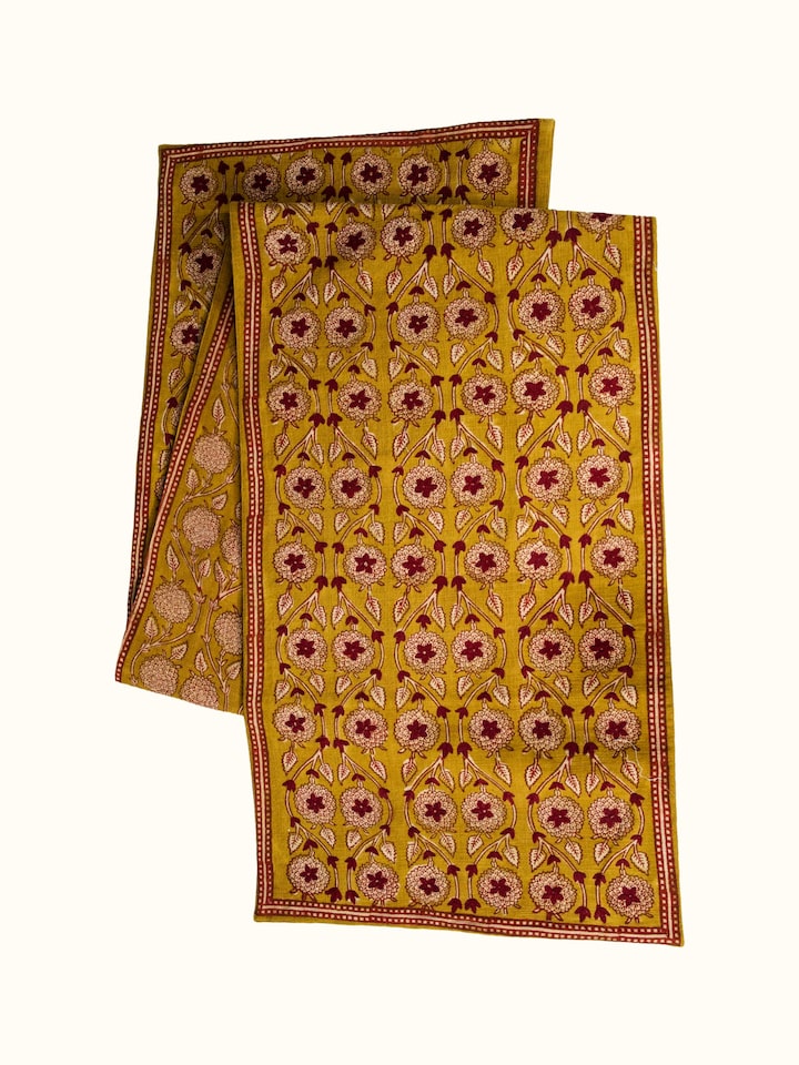 Top view of the Marigold Hand Block Dabu With Embroidery Floral Bed Runner