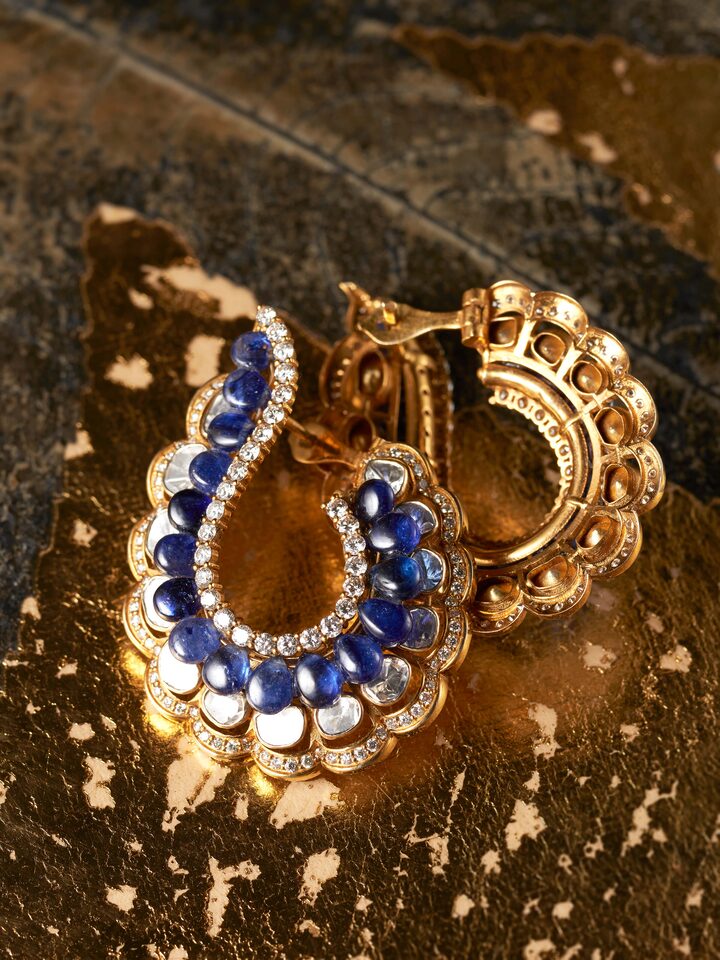 detail view of dank polki 14 karat gold hoop earrings design