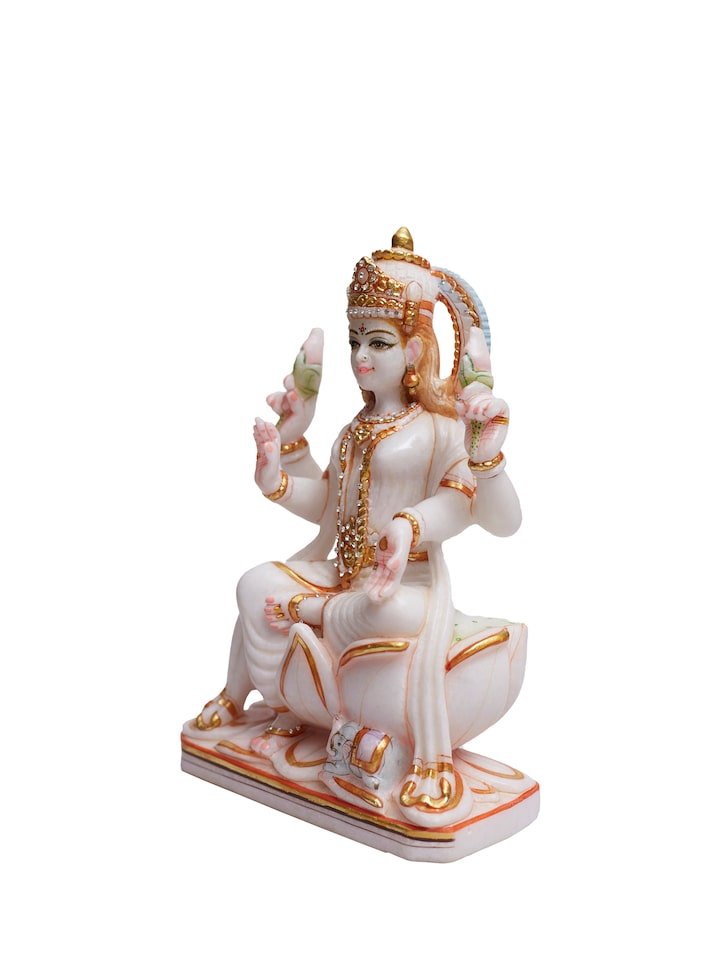 angled view of carved marble lakshmi idol