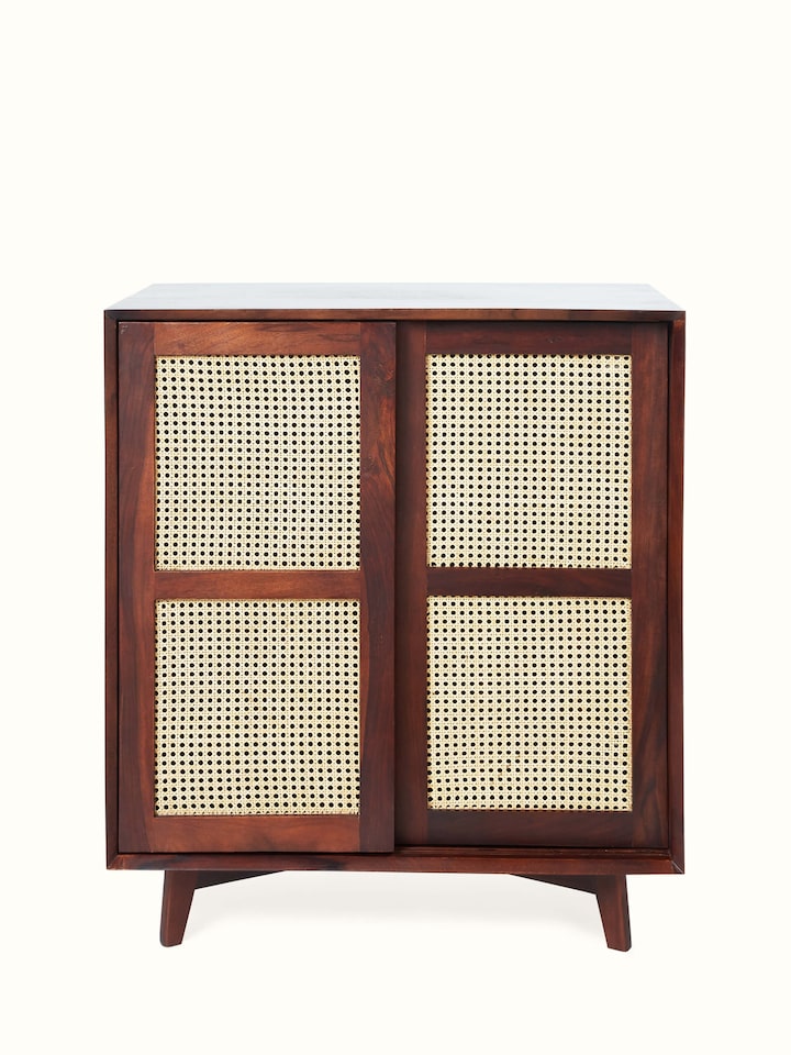 Front view of the Sheesham wood and cane bar cabinet, showcasing its elegant design and craftsmanship.