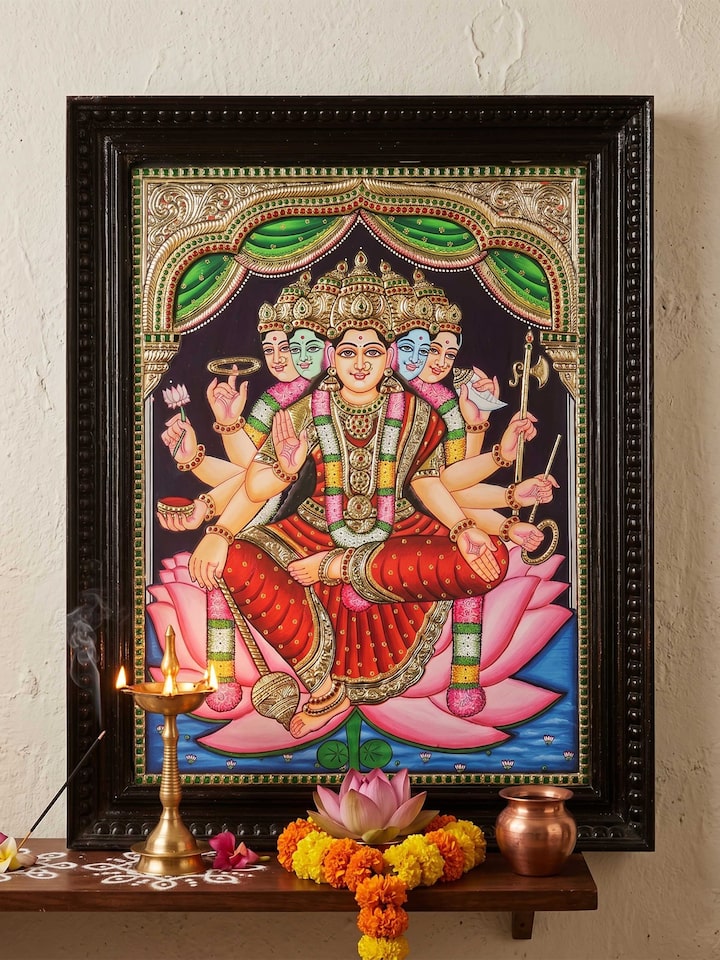 Styled view of Gayatri Devi Thanjavur Painting displayed against a styled backdrop