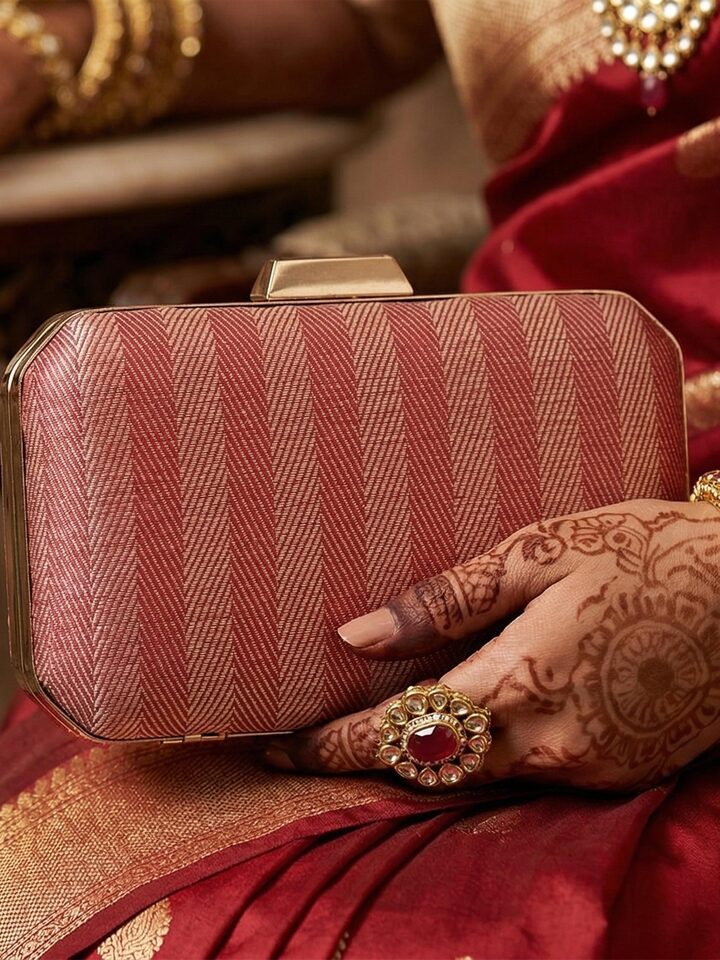 Front view of Maroon Banarasi Silk Clutch showing the front design and silhouette, from a different angle