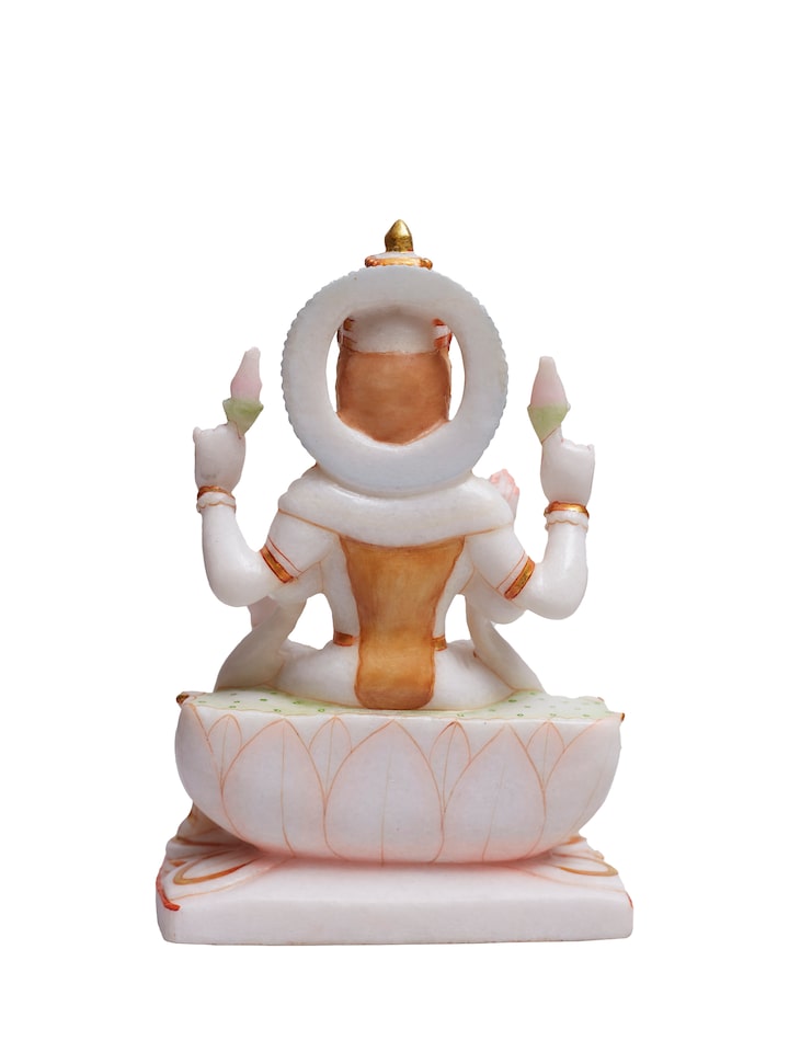back view of carved marble lakshmi idol