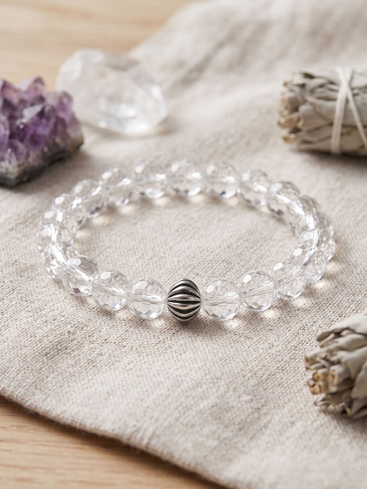 Styled view of Gemstone Sphatik Bead Silver Bracelet worn on the wrist, showing how it looks styled, from a different angle