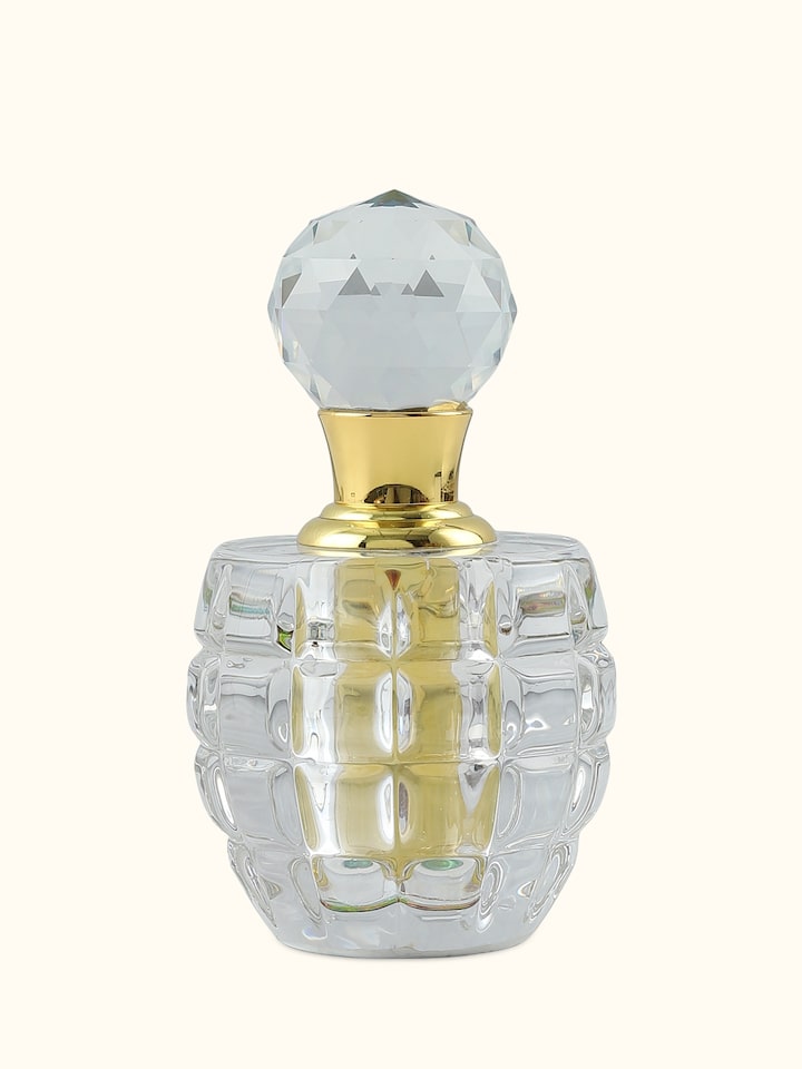 Front view of Attar Mitti perfume bottle featuring the rich brown tone and classic glass packaging