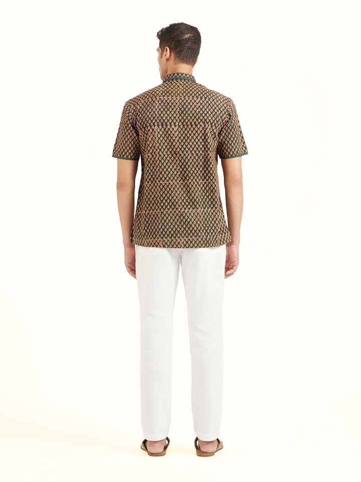 Back view of teal fadad hand block print pure cotton shirt displaying pattern continuity