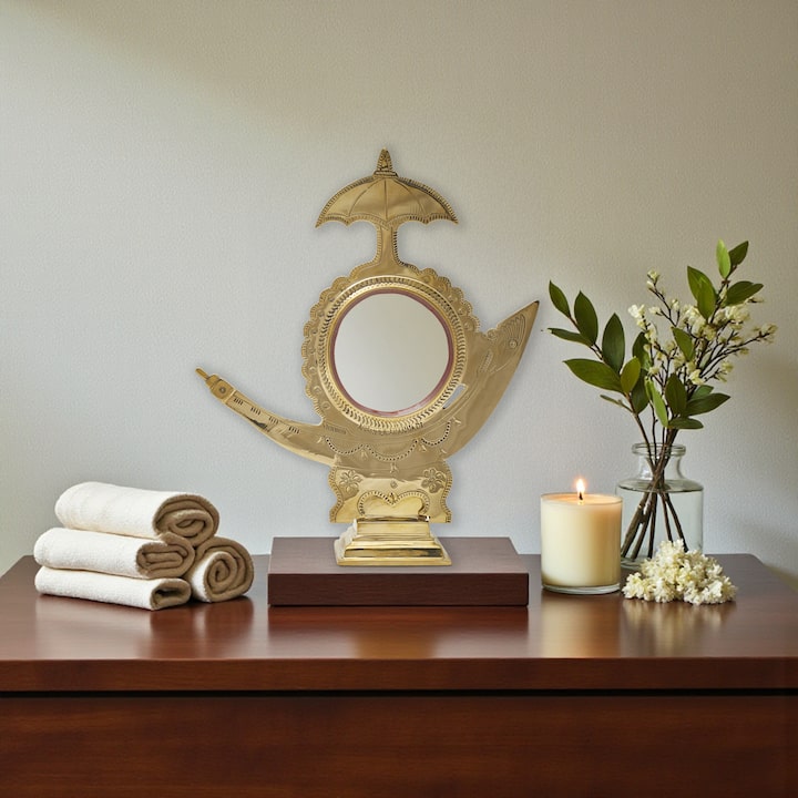 Lifestyle view of aranmula kannadi brass mirror traditional kerala decor