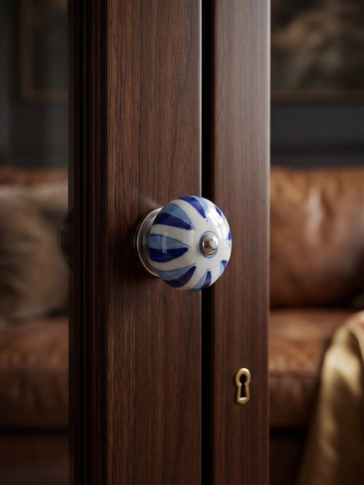 Styled view of Blue Pottery Round Rib Door Knob Set styled in a home setting