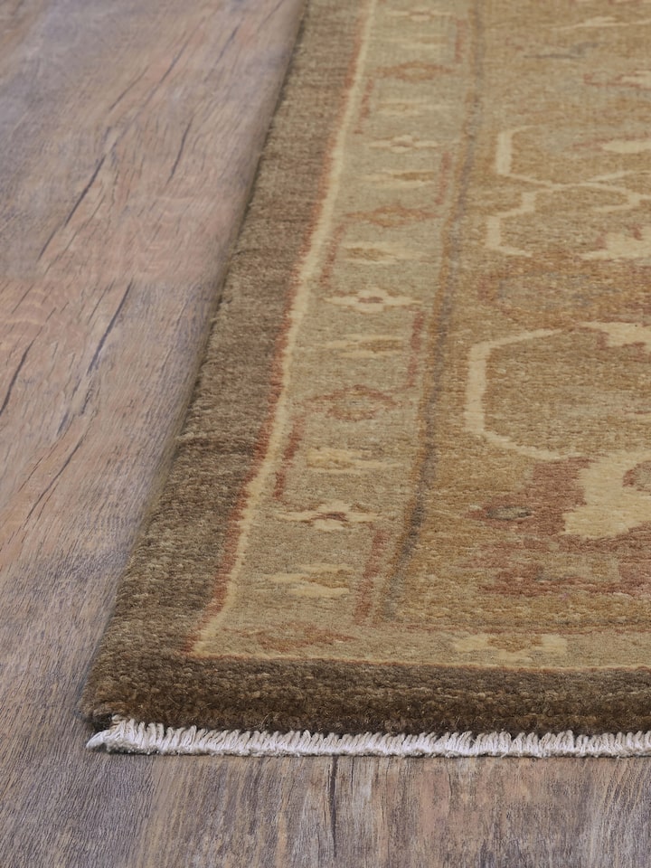 Angled perspective emphasizing the rug’s rich texture and detailed pattern
