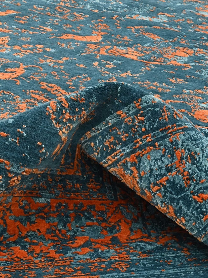 Detail view of Transitional Persian Blue Shikargah Bhadohi Wool & Bamboo Silk Hand Knotted Rug highlighting the intricate pattern and pile texture,...