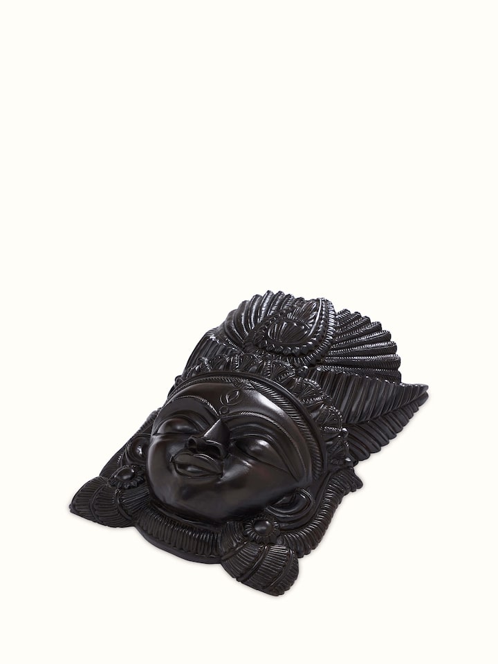 Angled view of Kushmandi Divine Wall Mask