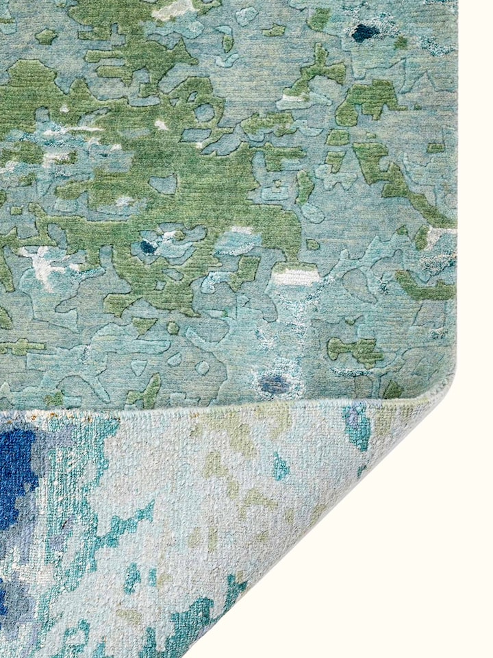 Back view of Abstract Blue Grey Bhadohi Wool & Bamboo Silk Hand Knotted Rug showing the reverse weave