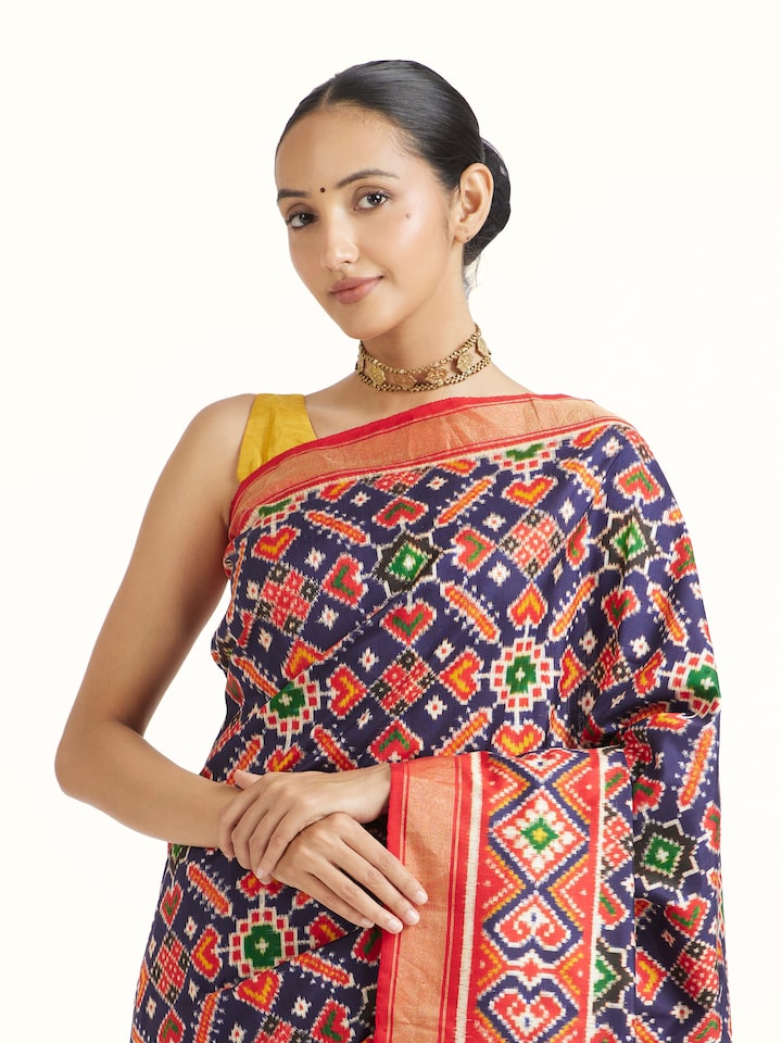 angled view of navy double ikat silk saree