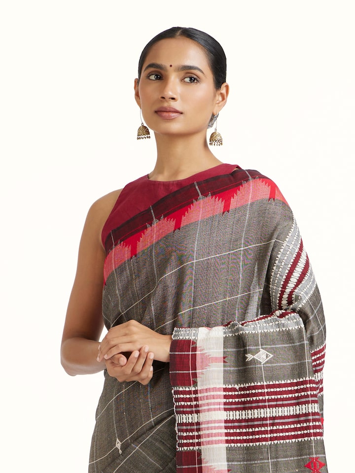 Angled view of Brown Cotton Tussar Silk Kotpad Saree revealing the depth of its color and intricate pattern