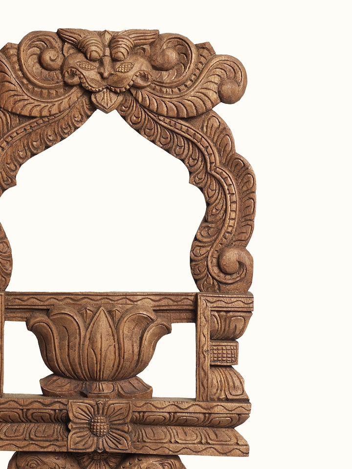 Detail view of the Wood Carved Parrot Mirror Panel