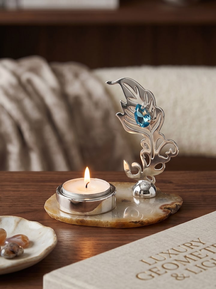 Left-side view of the Silver-plated Feather T-light Holder