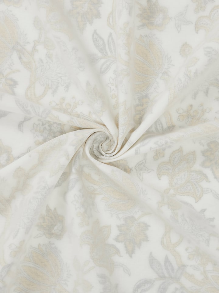 Close-up detail of fine hand block printing and fabric quality.