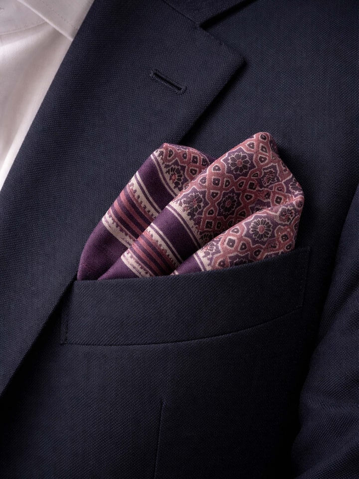 lifestyle view of assorted silk ajrakh block printed pocket squares gift set