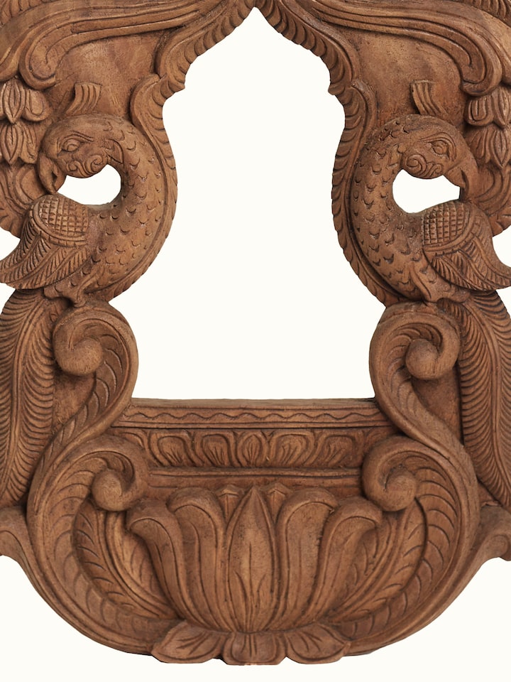 Detail view of the Wood Carved Parrot Mirror Frame