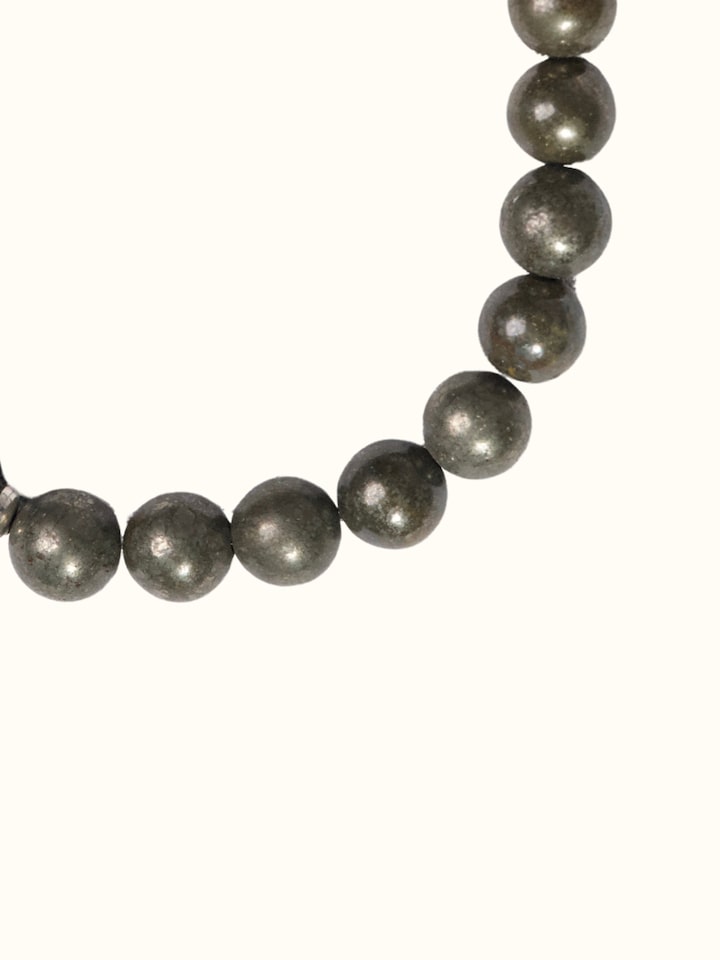 Detail view of Gemstone Pyrite & Black Onyx Bead Silver Bracelet highlighting the beadwork and stone detail