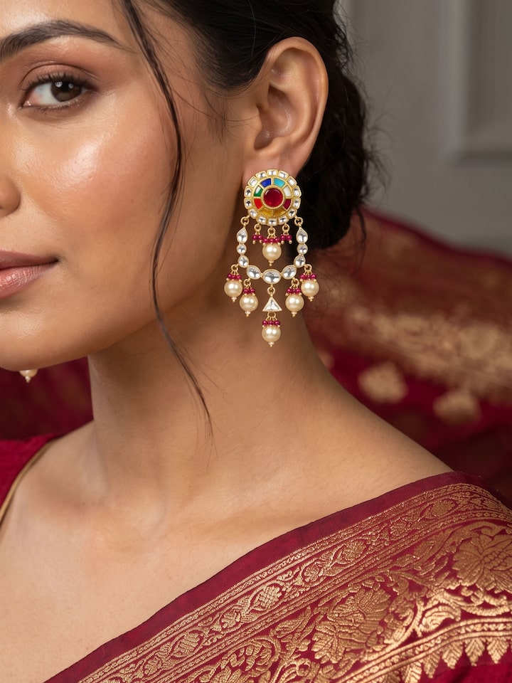 Styled view of Navratna Silver Drop Earrings worn on the ear, showing how it looks styled