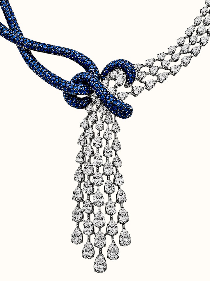 Detail view of Open Setting 14 Karat White Gold Set with Diamonds, Sapphires And Rubies highlighting the stone setting and metalwork detail
