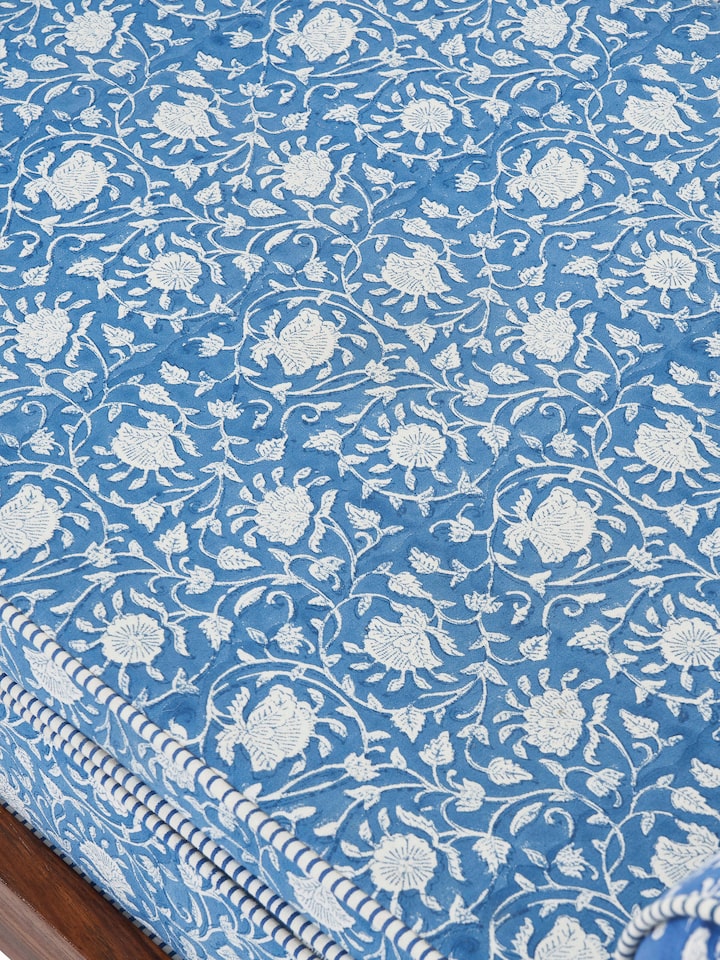 Back view of Sheesham wood Sanganeri block print bench highlighting its structure