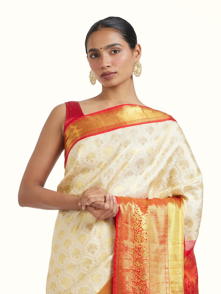 angled view of white silk dharmavaram saree