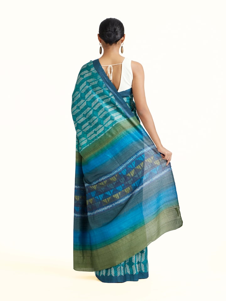 Back view of Sea Green Tussar Silk Discharge Block Printed Saree emphasizing the overall design and fine details