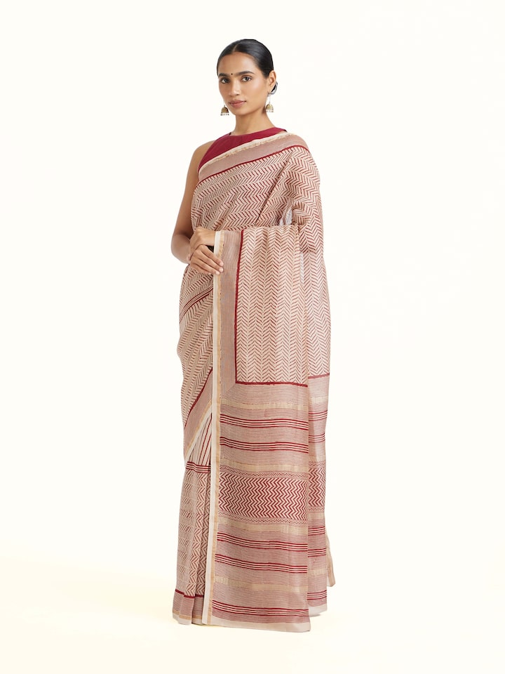 Side view of Red Chanderi Cotton Silk Bagh Block Printed Saree highlighting the detailed craftsmanship and elegant silhouette