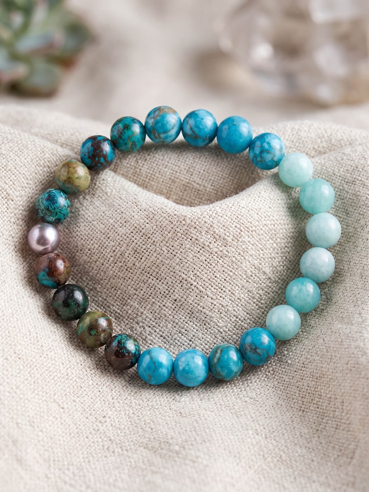 Styled view of Gemstone Silver Turquoise, Amazonite and Chrysocolla Bead Silver Bracelet worn on the wrist, showing how it looks styled, from a dif...