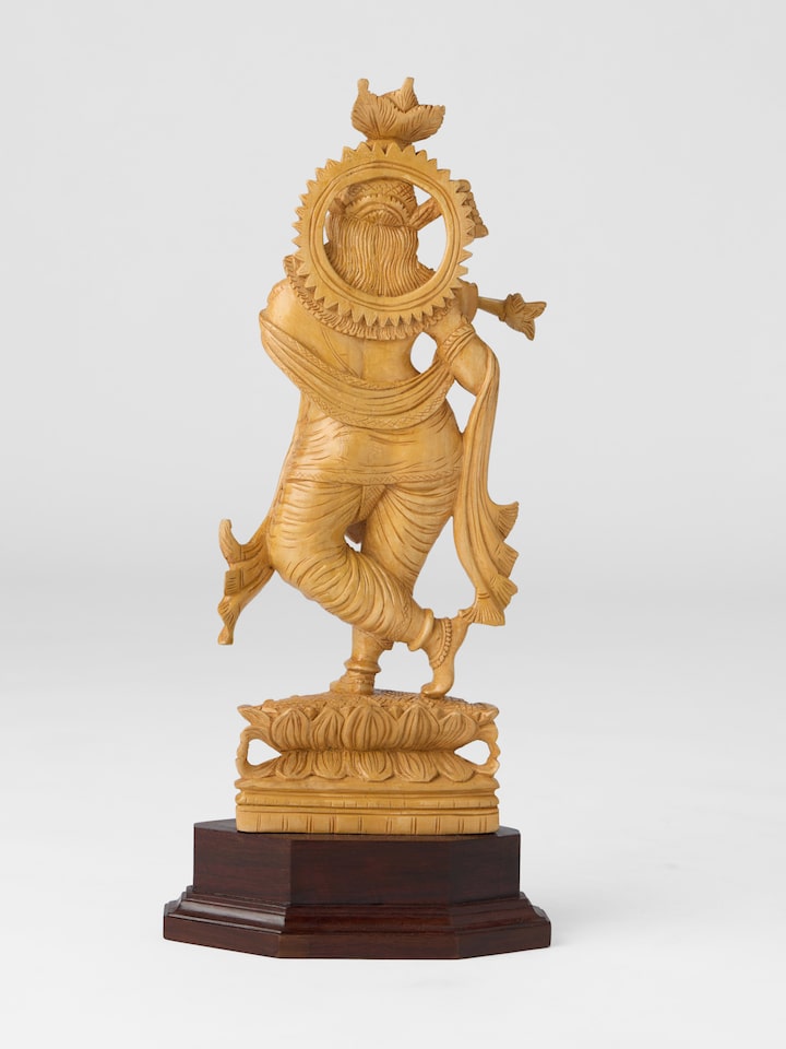 Back view of the Wood Carved Krishna Flute Idol