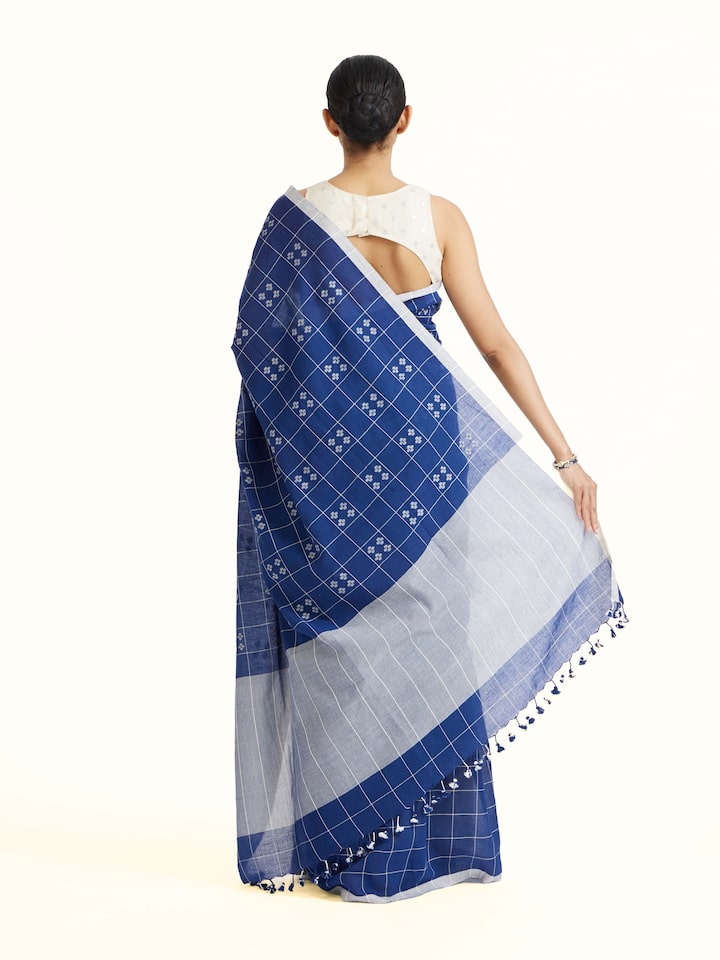 Back view of Blue Muslin Jamdani Saree emphasizing the overall design and fine details